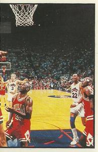 1992-93 Panini Stickers #14 Eastern Playoffs (Action scene right) Front